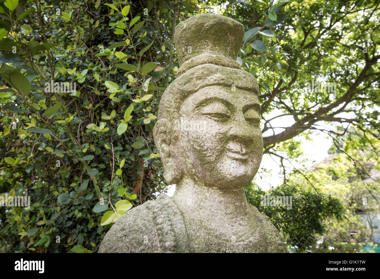 Chinese statue of worship Stock Photo Alamy