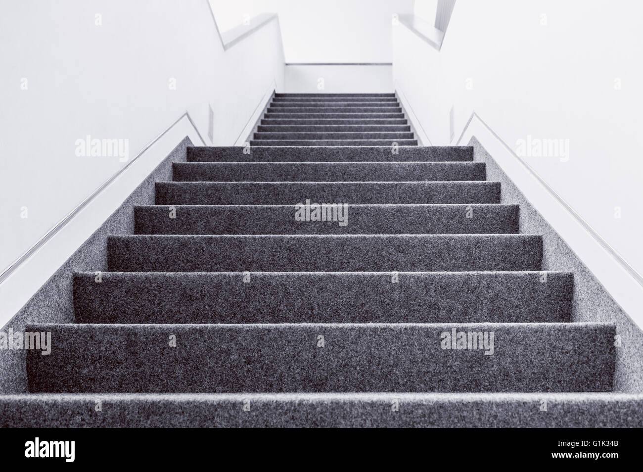 Black and white picture of empty indoor steps Stock Photo