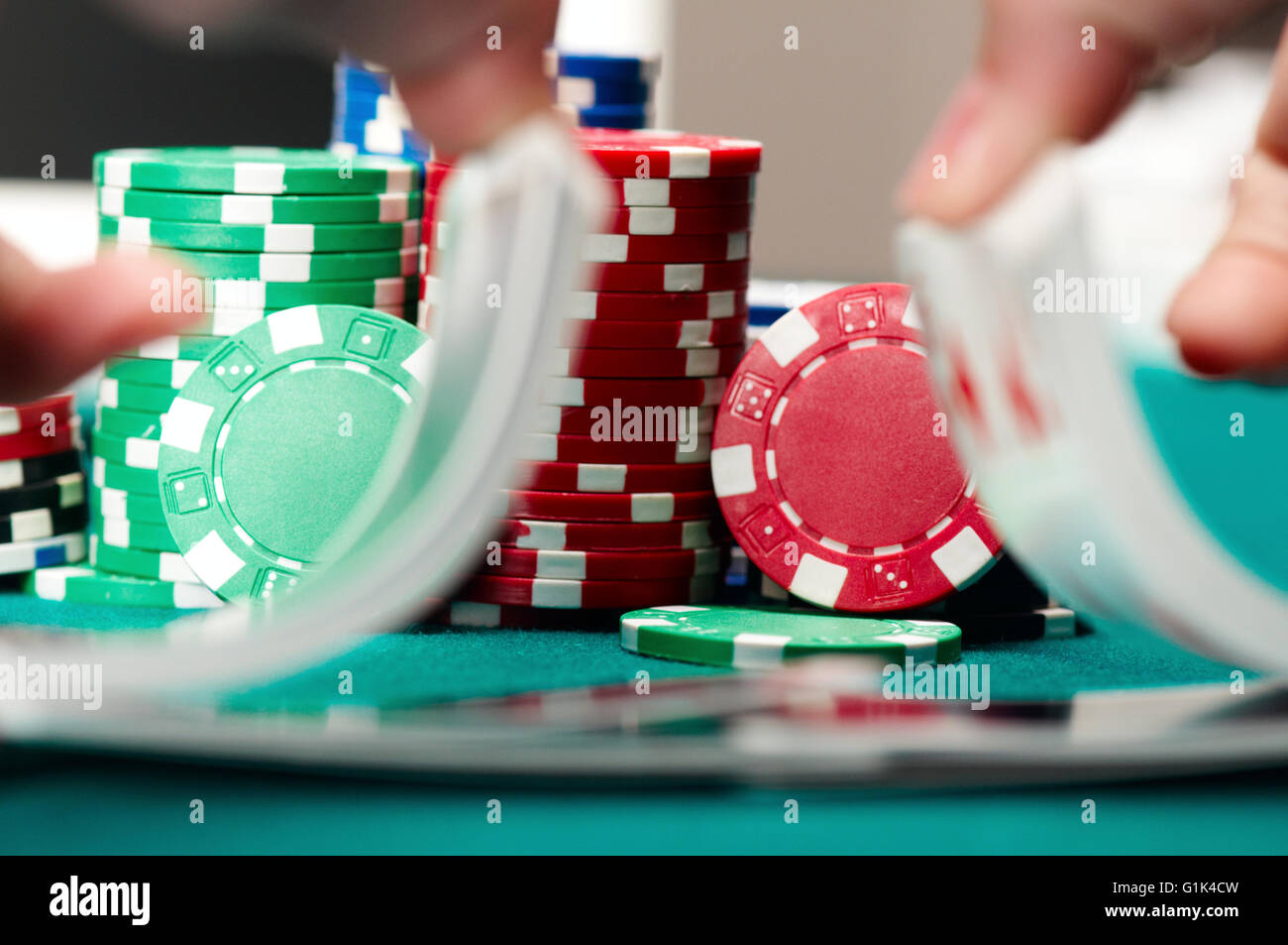 Playing poker in casino. Stock Photo