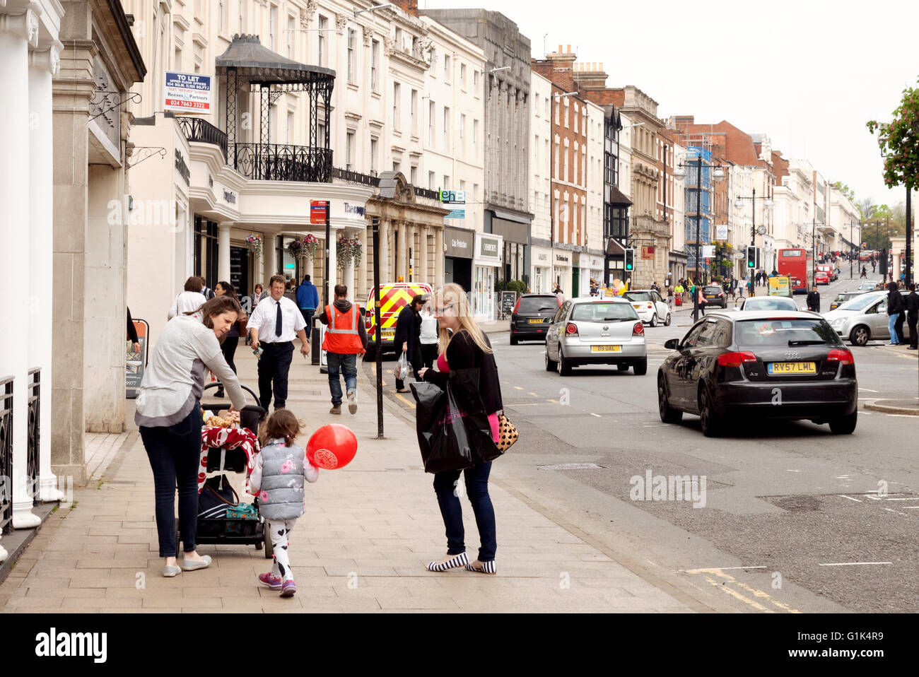 People and traffic on The Parade, Royal Leamington Spa, Warwickshire England UK Stock Photo Alamy