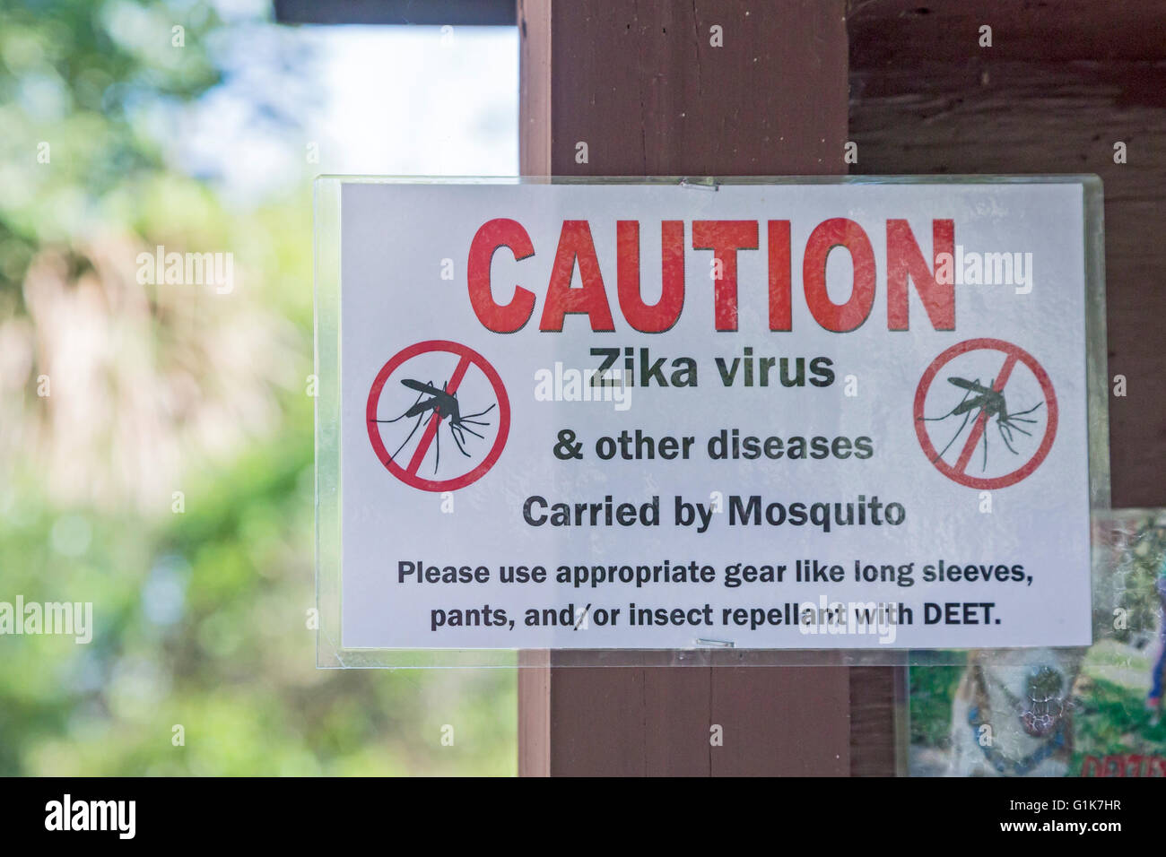 Jacksonville, Florida - A Zika virus warning posted near the hiking trails in the Timucuan Ecological and Historic Preserve. Stock Photo