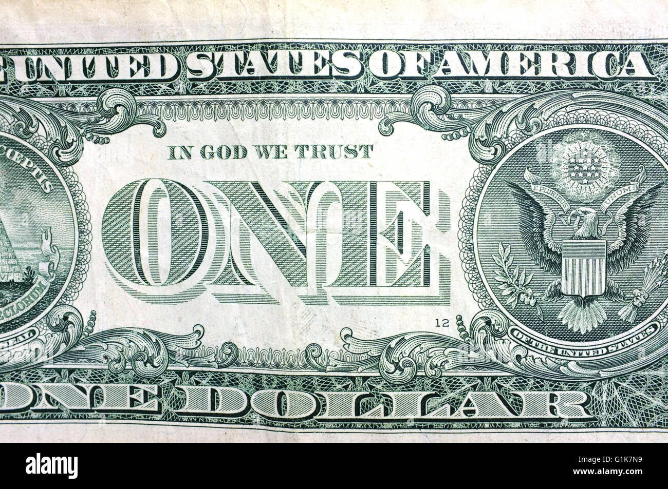 A close view of the back of an American One Dollar bill photographed against a white background. Stock Photo