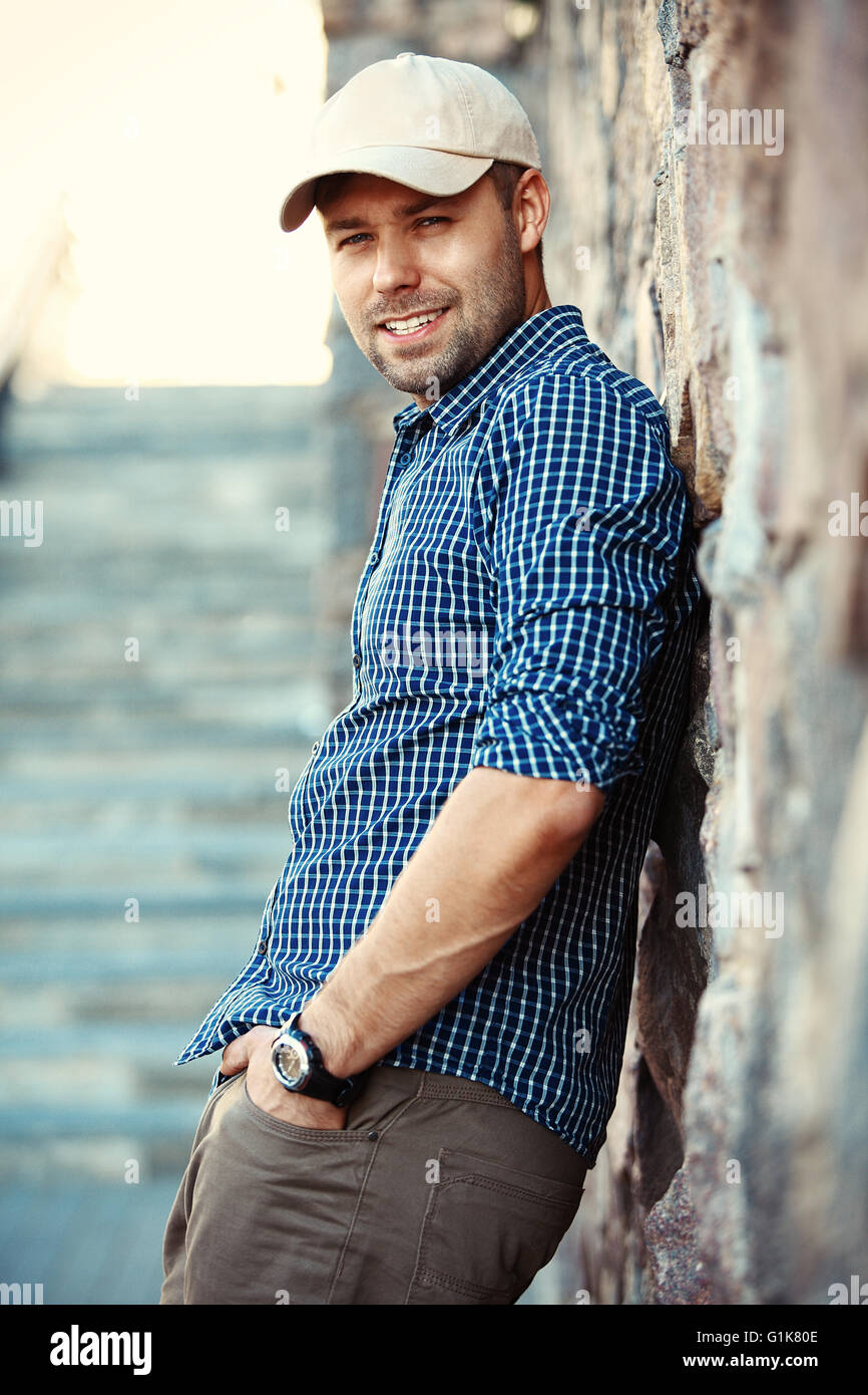 portrait of trendy young man in the city Stock Photo - Alamy