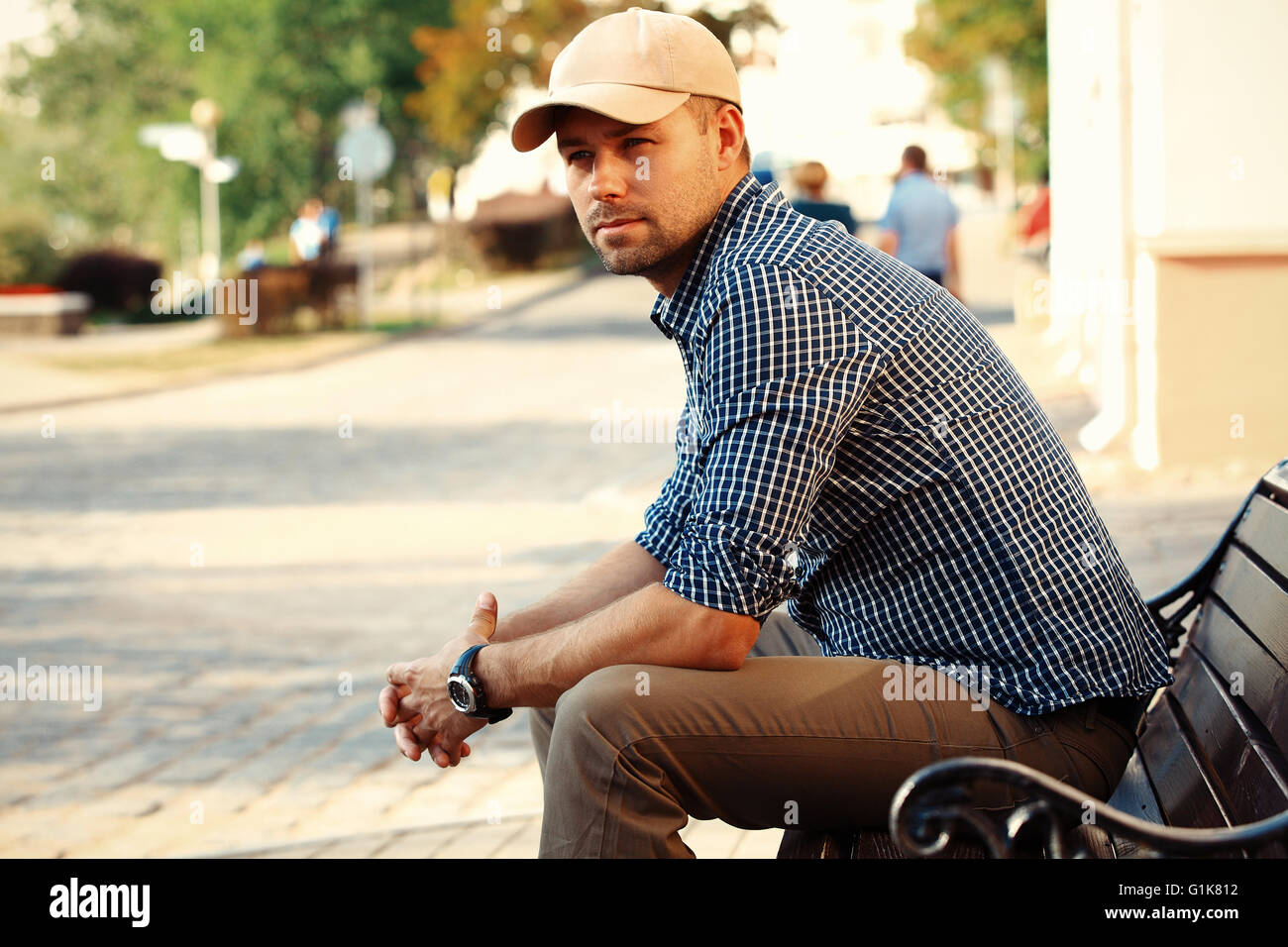 portrait of trendy young man in the city Stock Photo - Alamy