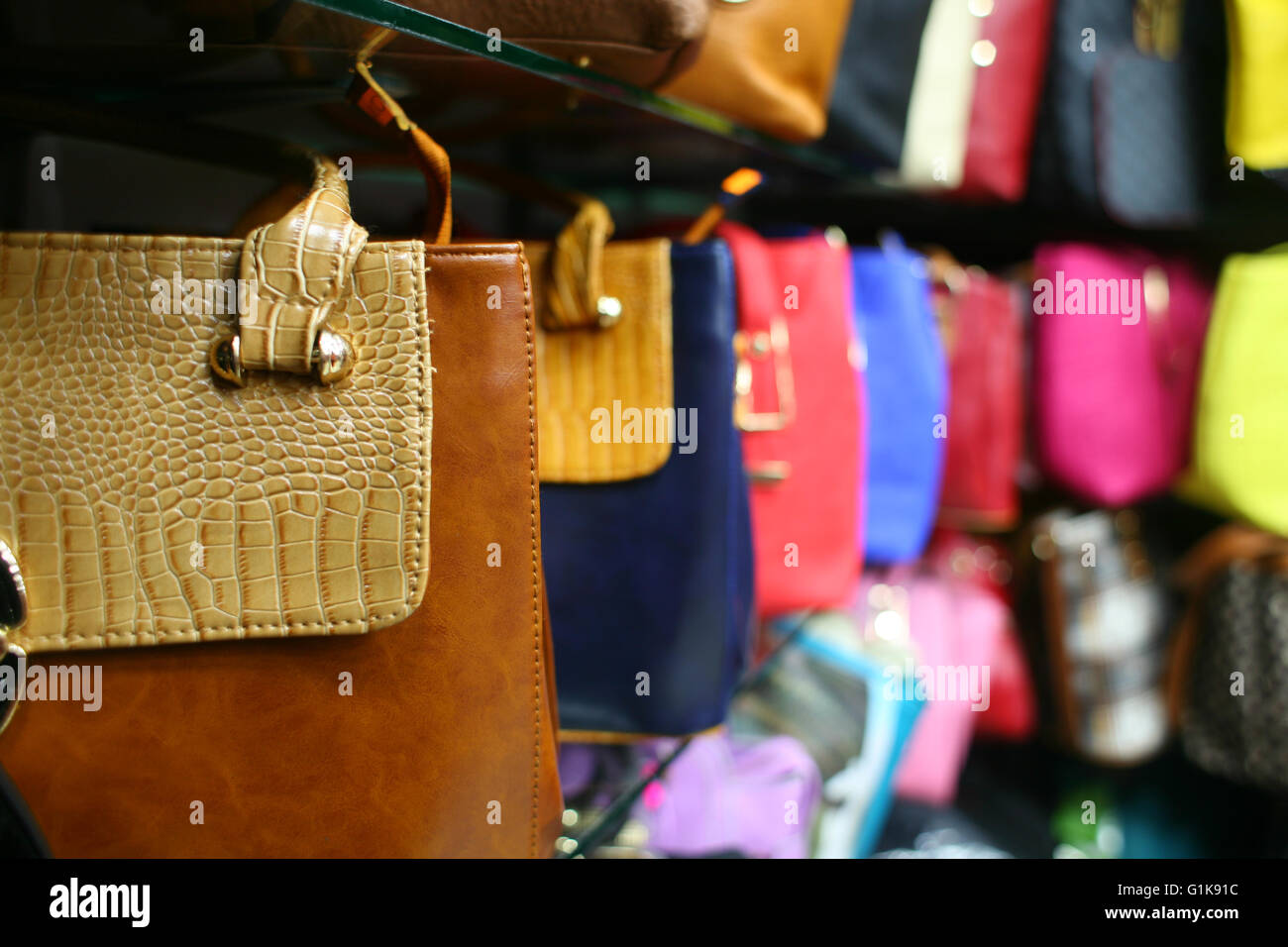 new colorful woman leather bag on market for sell Stock Photo