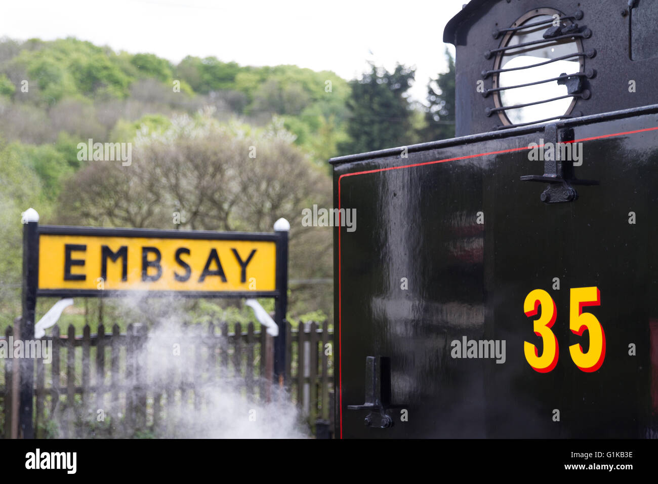 National Coal Board - NCB - industrial steam locomotive number 35 'Norman' at Embsay with the station sign in the background Stock Photo