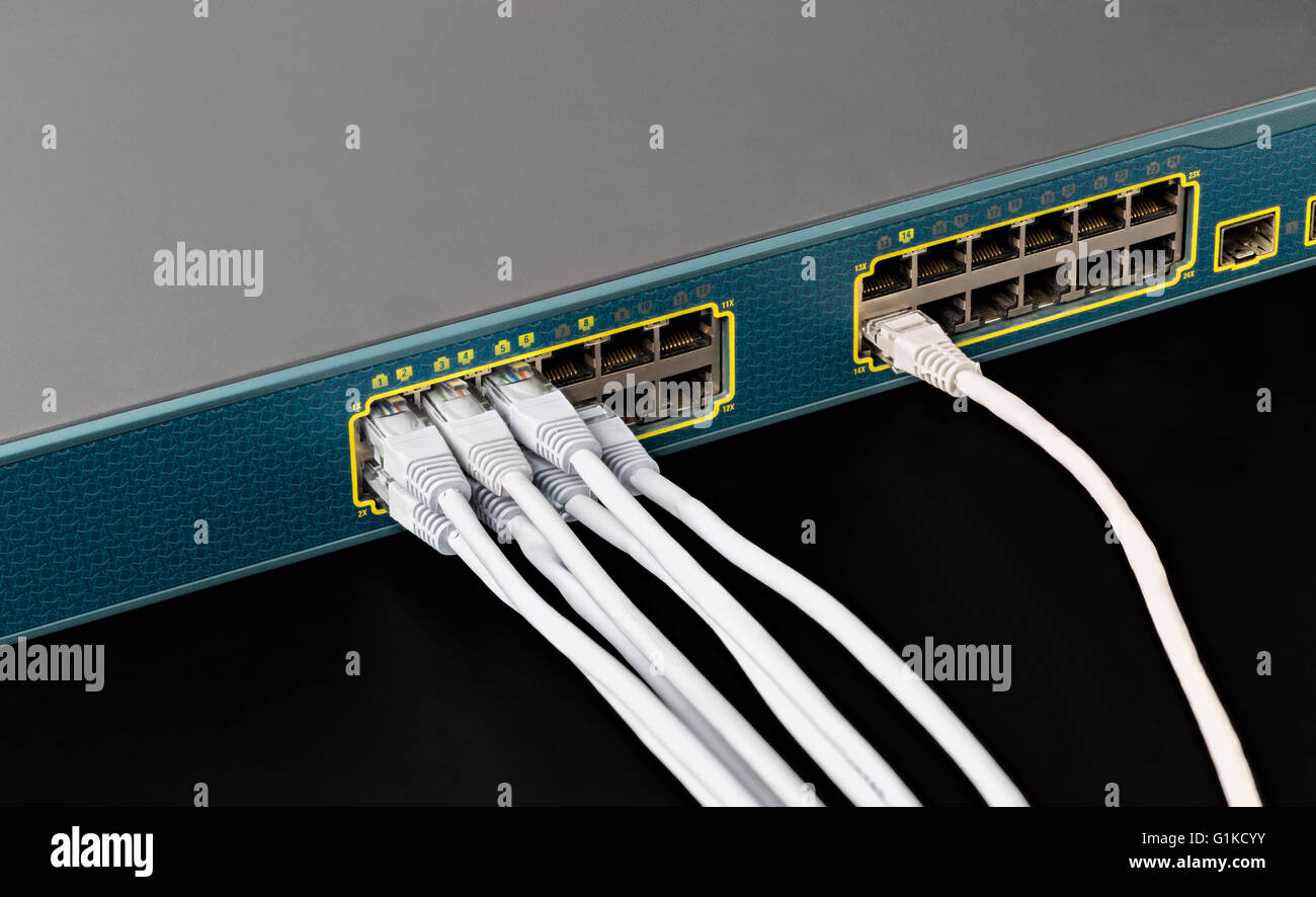Smart lan switch with 24 ethernet and gbic optical ports Stock Photo