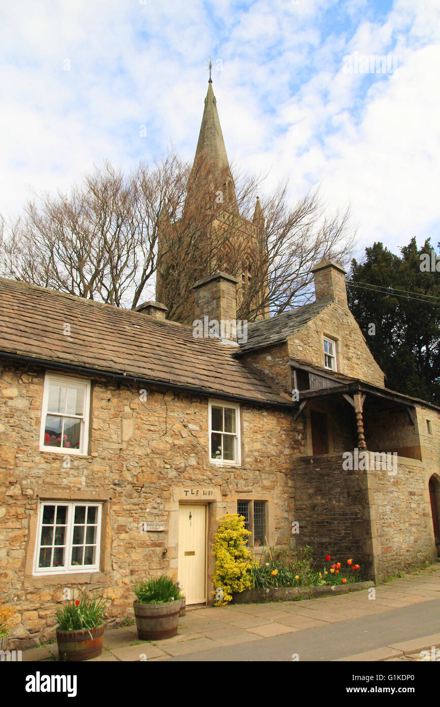 Church spire & old cottage at Alston, Cumbria Stock Photo Alamy