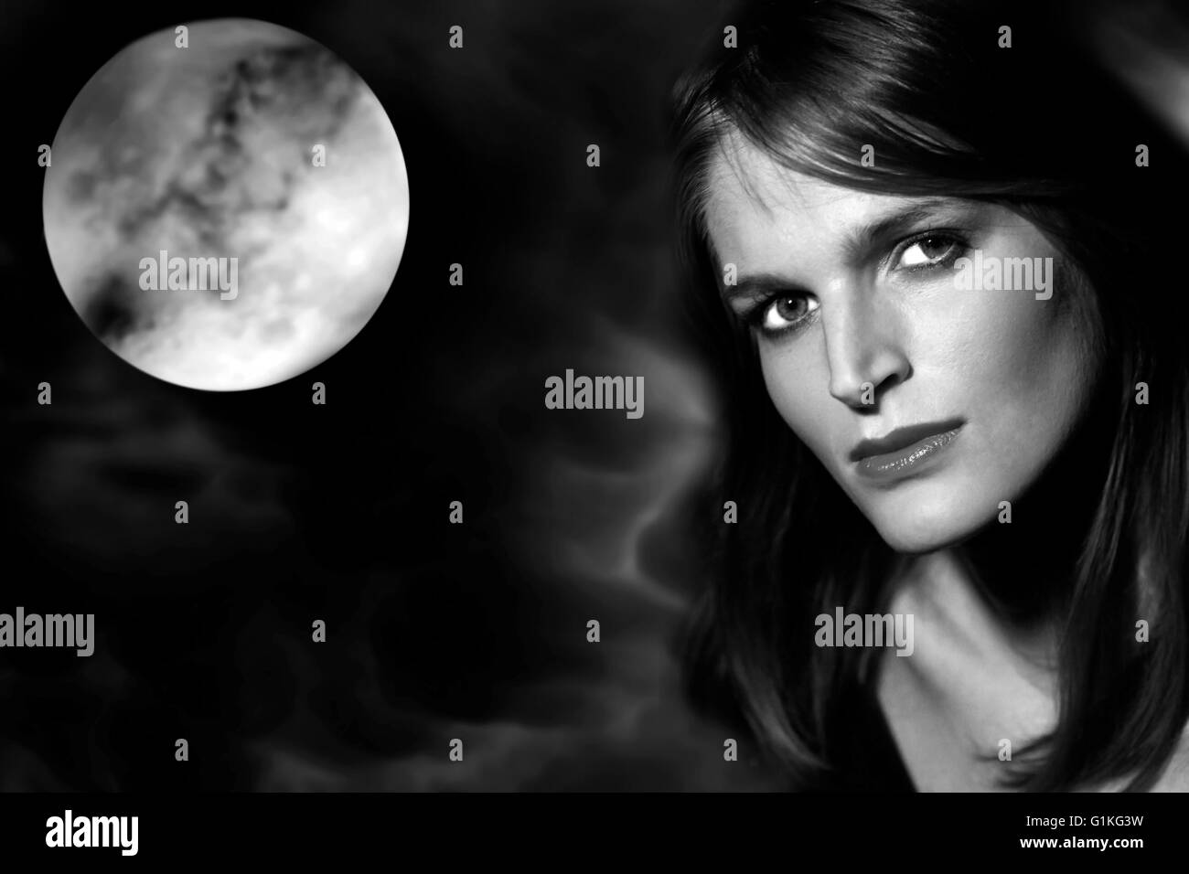 Woman in moonlight Stock Photo