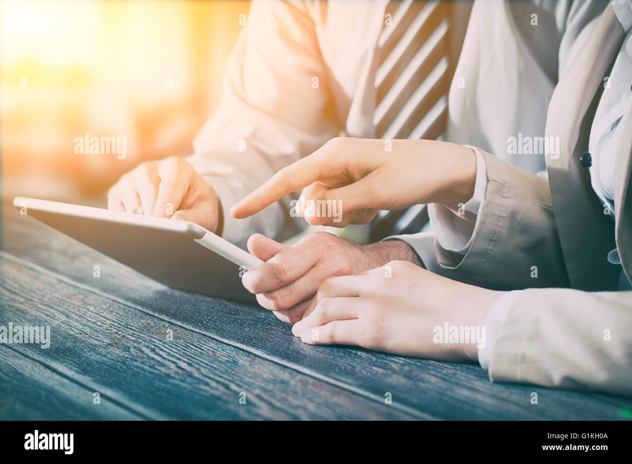 business meeting executive consulting review career report tablet - stock image Stock Photo