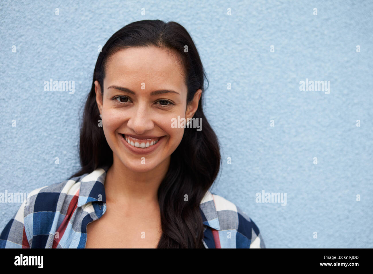 Head and shoulders portrait of smiling Hispanic woman Stock Photo - Alamy