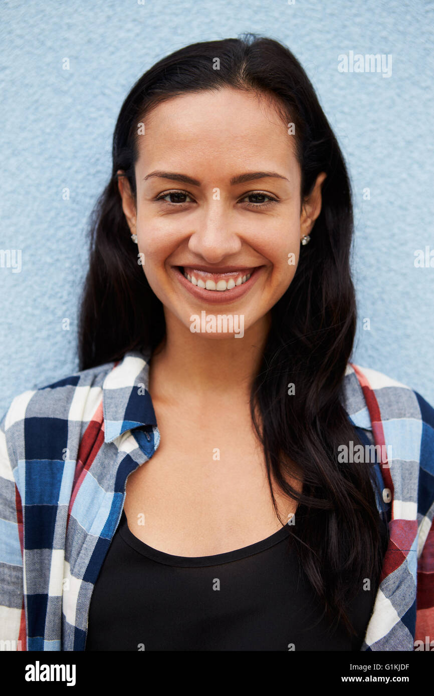 Vertical portrait of smiling Hispanic woman Stock Photo - Alamy