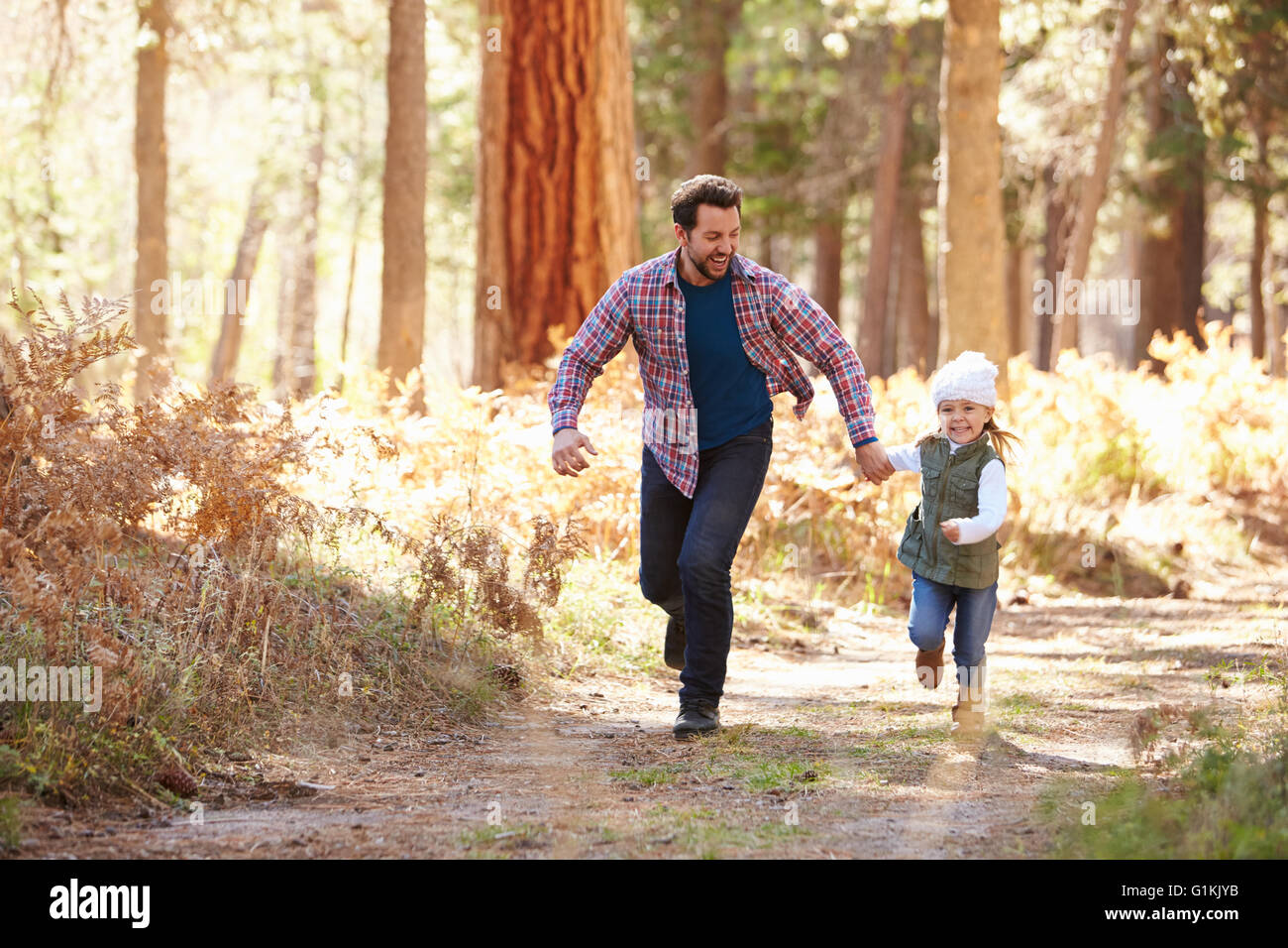 Father and daughter together in the forest hi-res stock photography and ...
