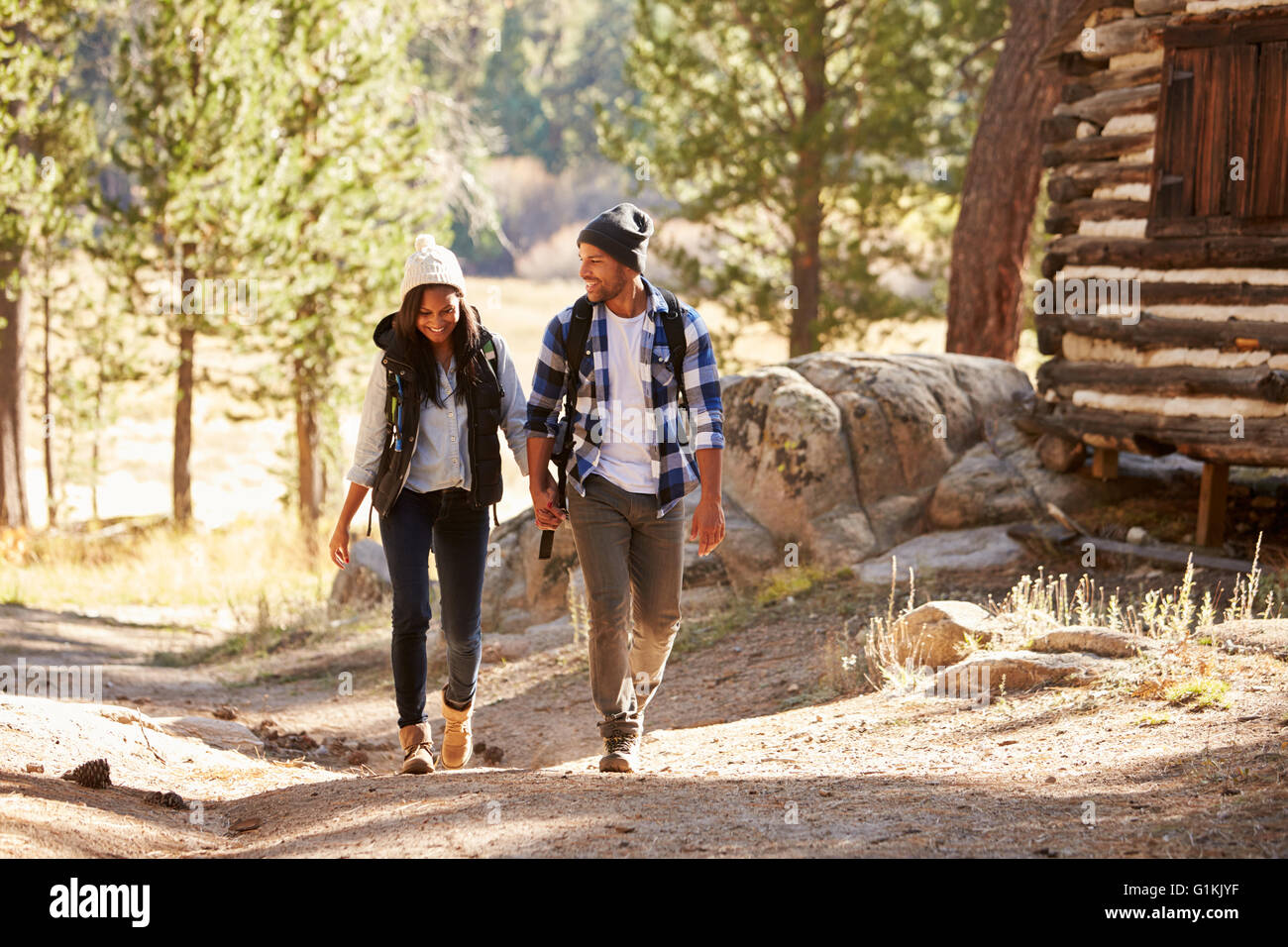 African American Couple Walking Through Fall Woodland Stock Photo - Alamy