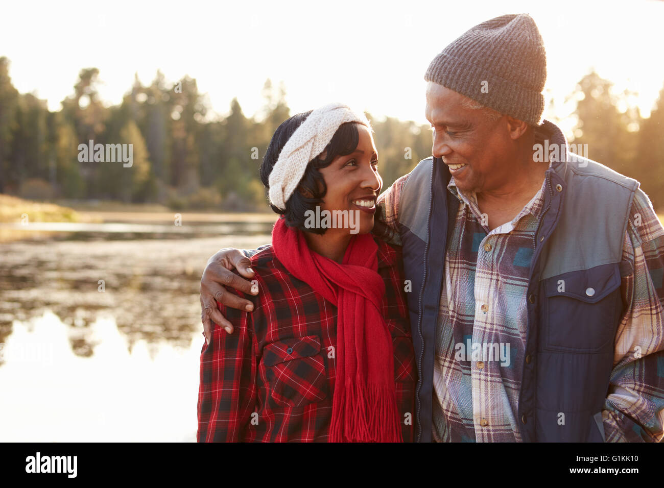 Senior African American Couple Walking By Lake Stock Photo - Alamy
