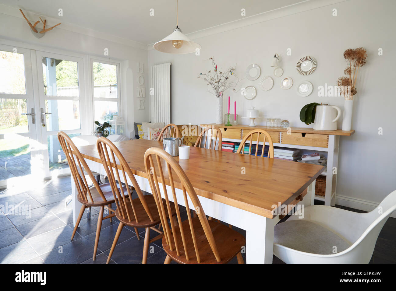 Dining Room In Contemporary Family Home Stock Photo Alamy