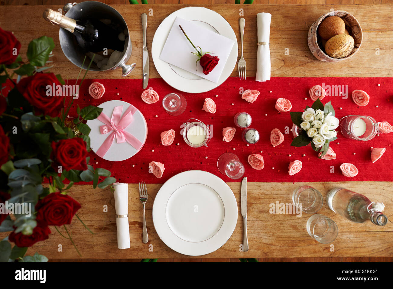 Overhead View Of Table Set For Romantic Valentines Day Meal Stock Photo