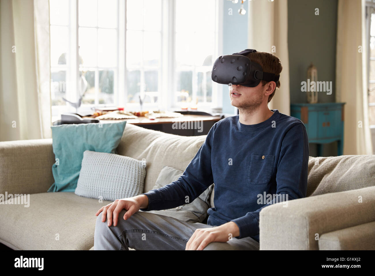 Young Woman Wearing Virtual Reality Headset In Studio Stock Photo - Alamy
