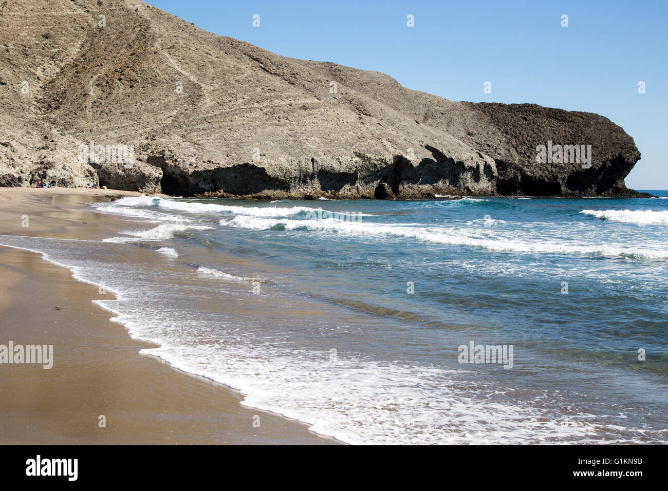 Rocky Headland At Playa Monsul Sandy Beach Cabo De Gata Natural Park Almeria Spain Stock