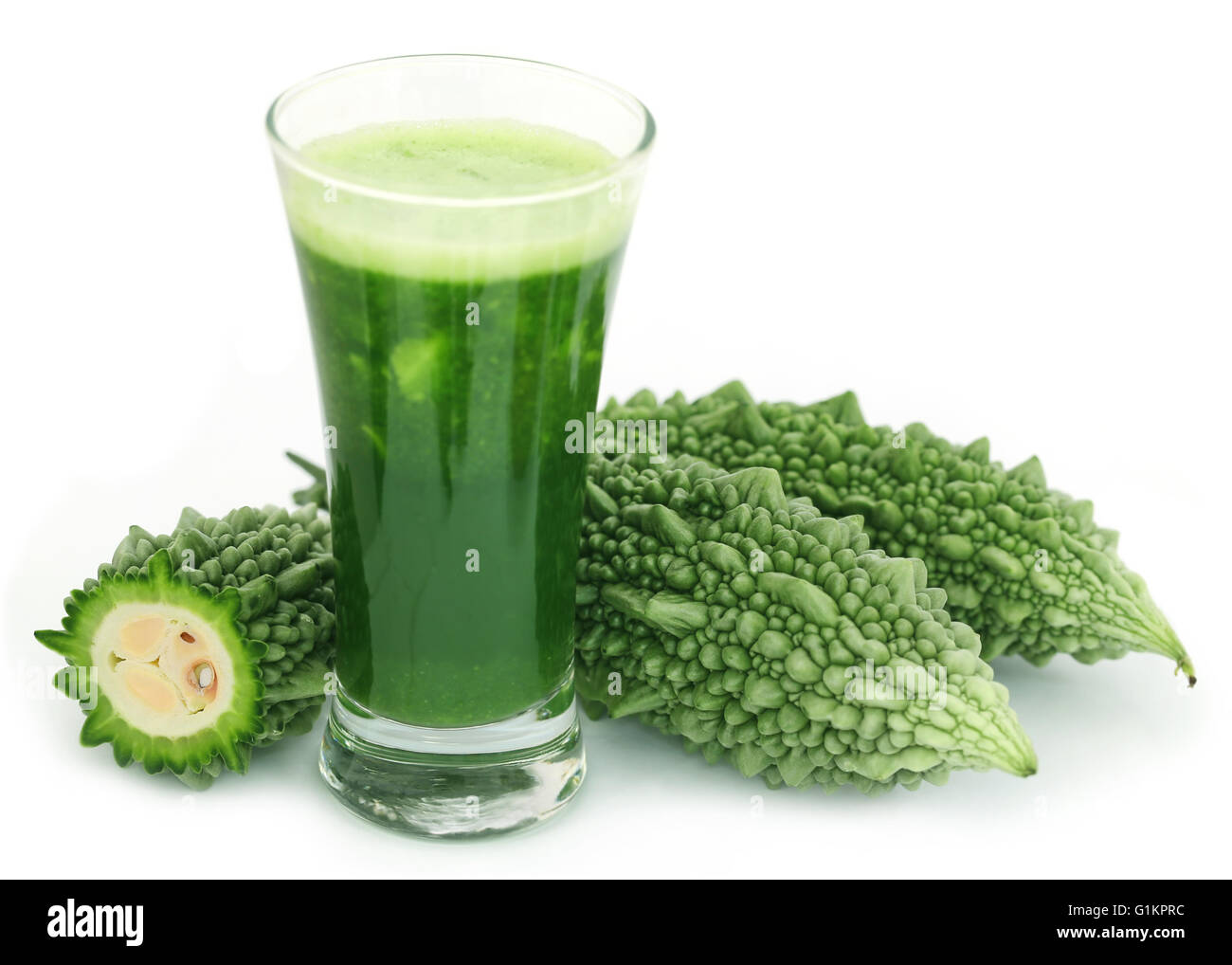 Herbal juice of green momodica in a glass with fresh vegetables Stock Photo  - Alamy