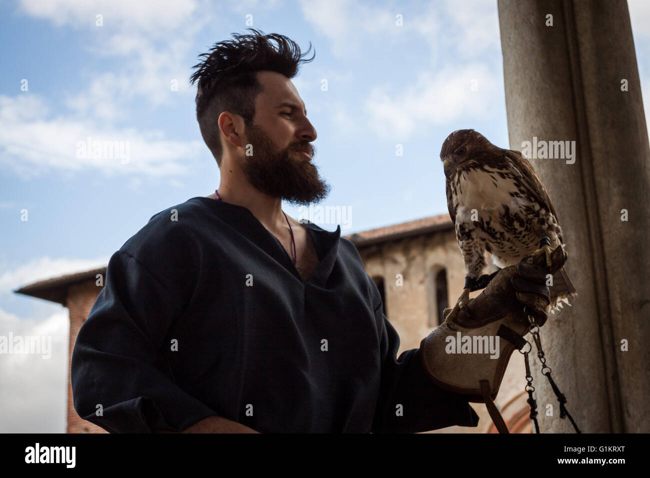 Expert falconer and splendid specimens of rapacious. Vigevano, Lombardy. Italy Stock Photo