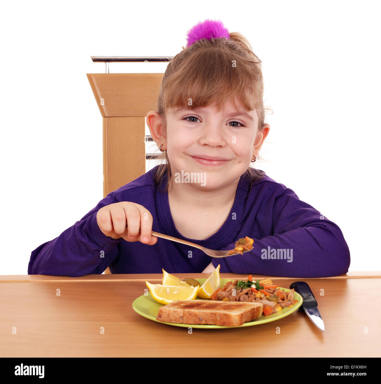 little girl eating Stock Photo