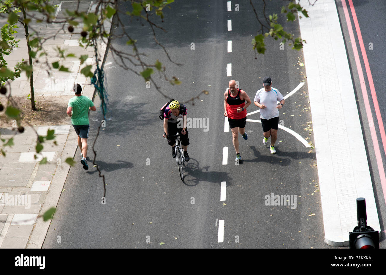 cycle superhighway Embankment joggers cyclists Stock Photo