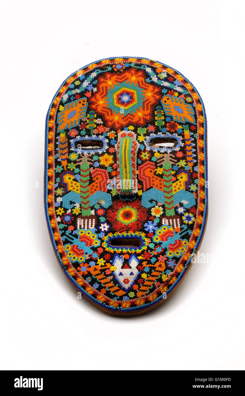 Huichol beaded Mexican Masks Stock Photo