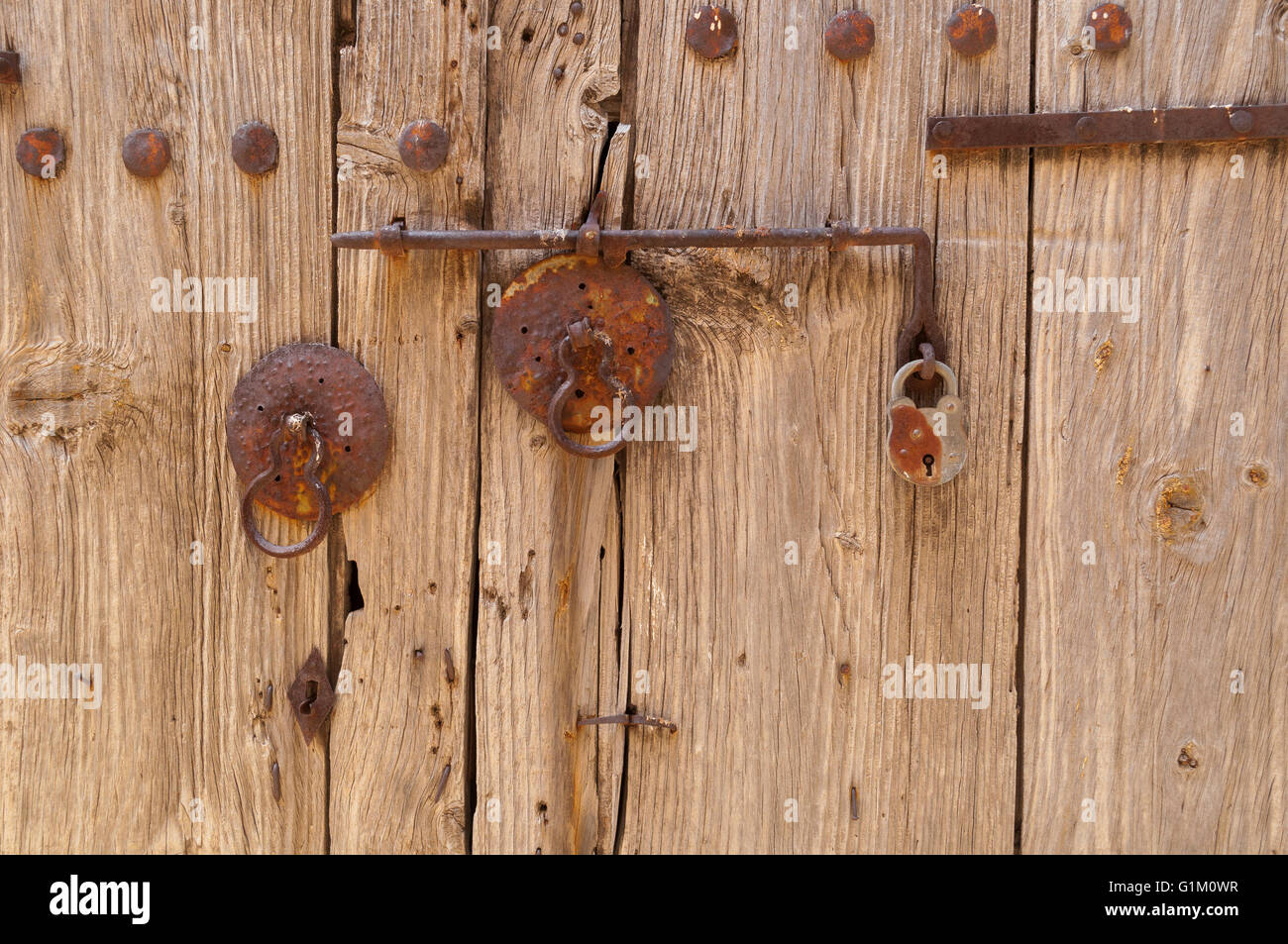Close up of wooden door in mediterranean village.  This picture was taken in Pano Lefkara,Cyprus.  Which is not far from Lissaso Stock Photo