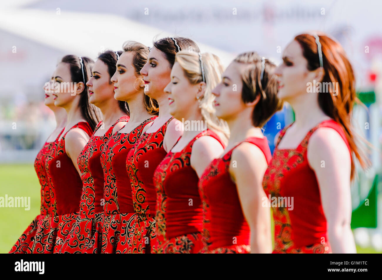 Eight young Irish dancing girls at an outdoor event. Stock Photo