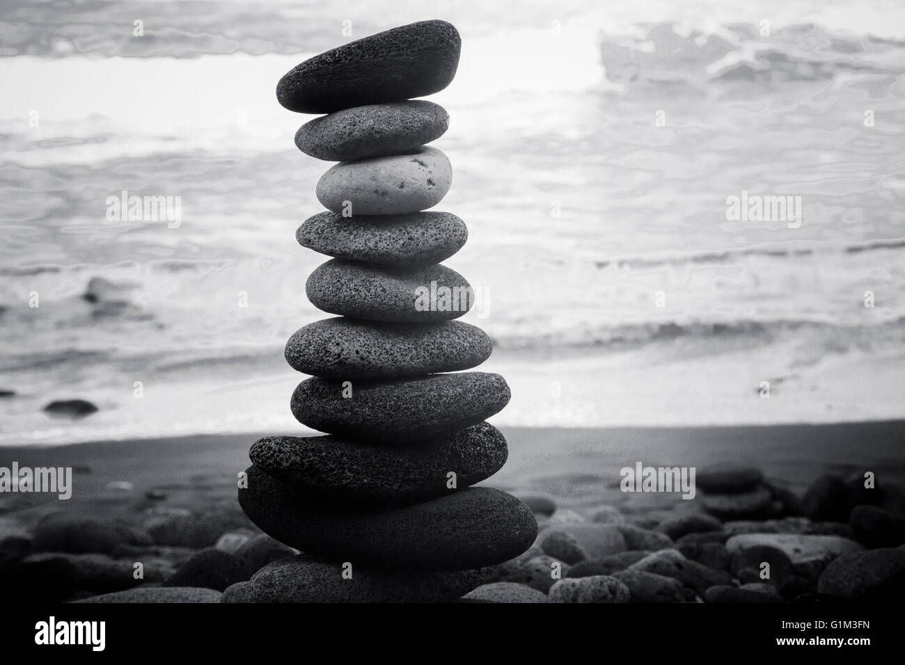 Stacked rocks on beach Stock Photo Alamy