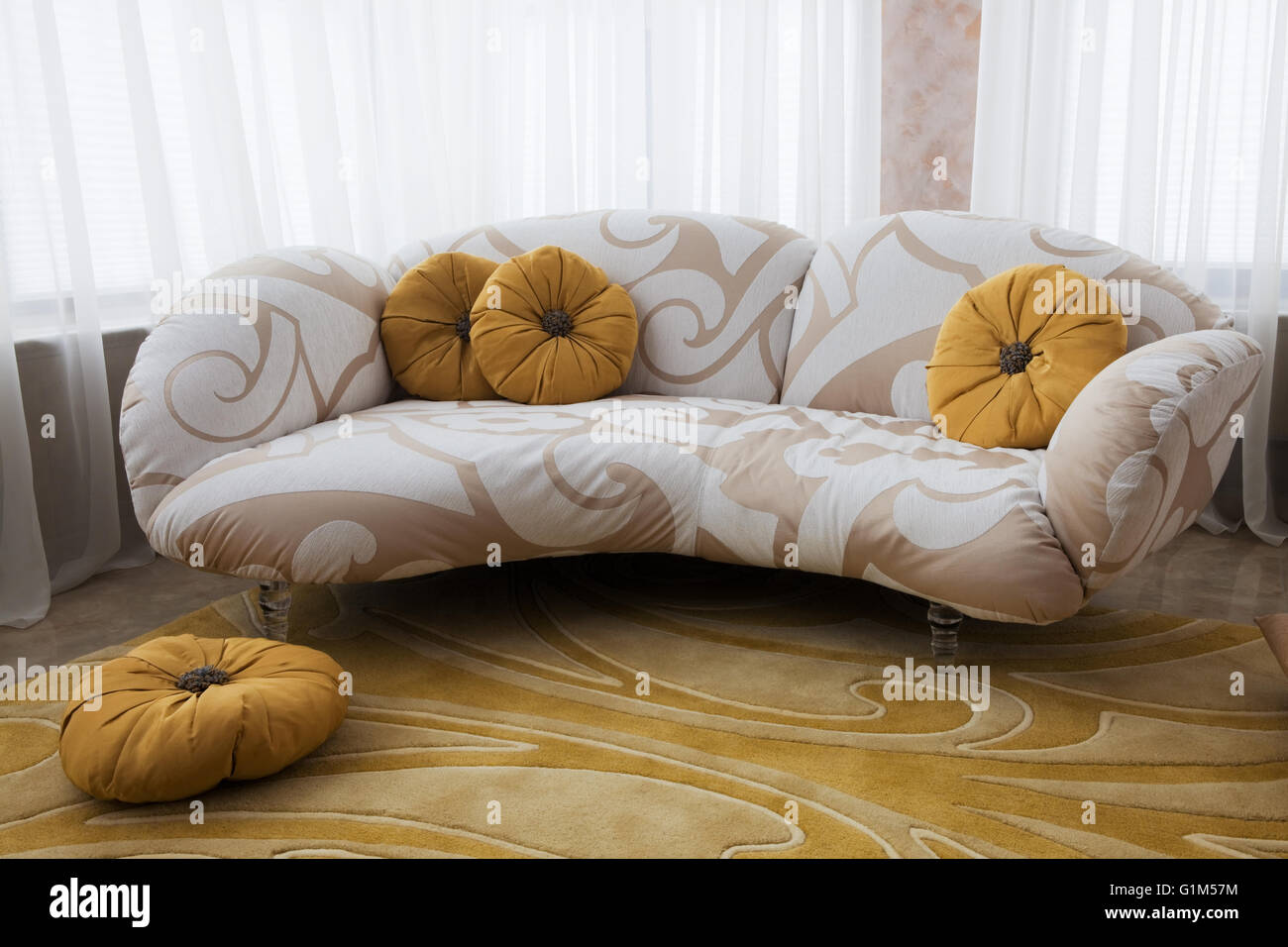 beautiful sofa near the window in the apartment Stock Photo Alamy