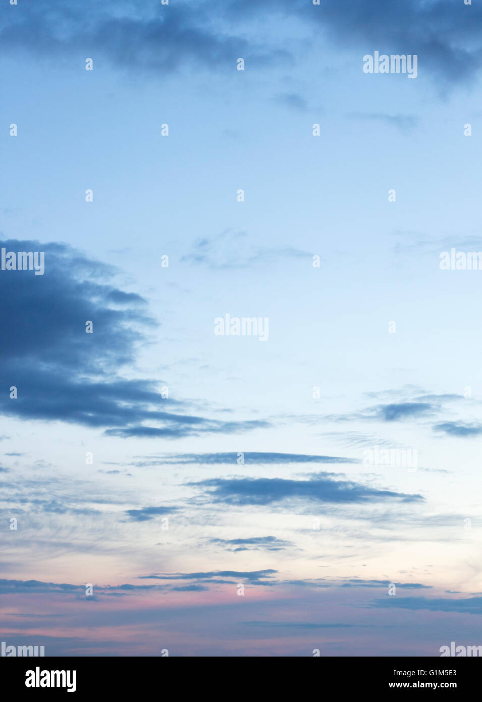 Sunset blue sky with clouds color photo Stock Photo - Alamy