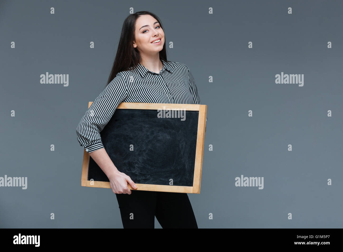 Black woman holding sign cutout hi-res stock photography and images - Alamy