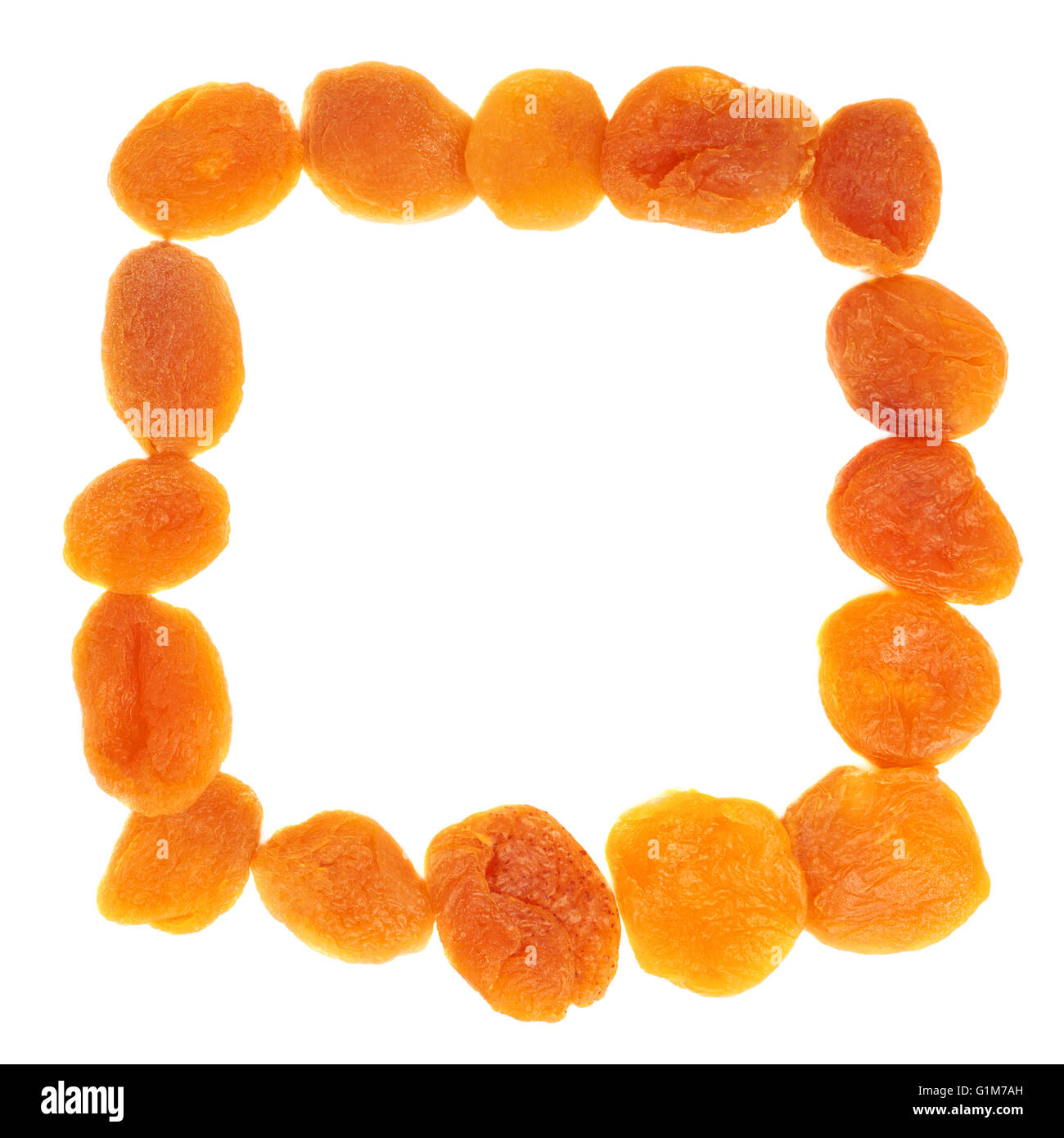 Dried orange apricots over white background Stock Photo Alamy