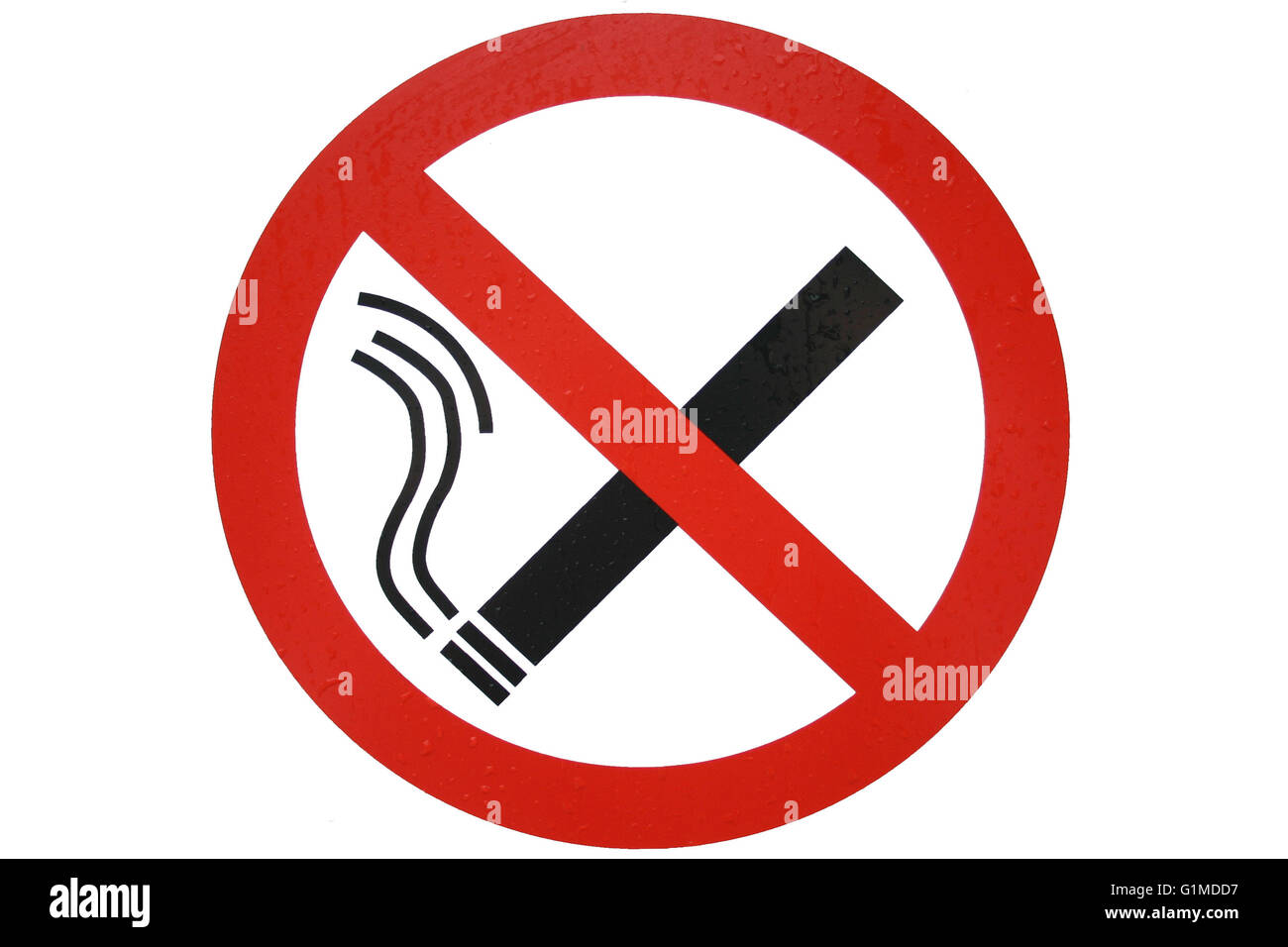 A red circular no smoking sign isolated on white depicting a cigarette in black crossed by a diagonal line Stock Photo