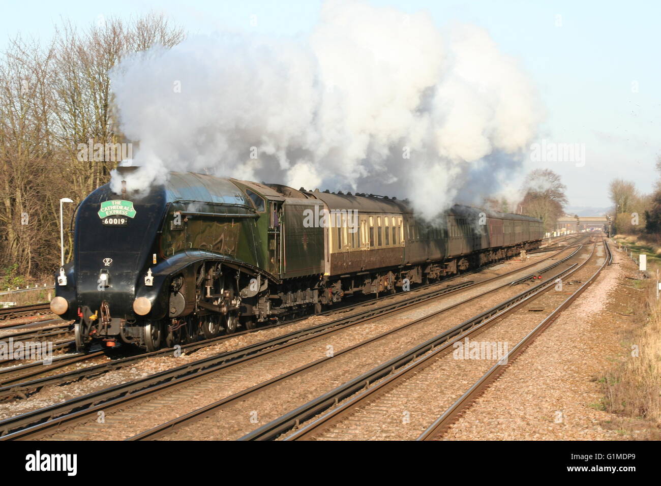 60019 BITTERN approaching Three Bridges with a Cathedrals Express from London Victoria to Chichester Stock Photo
