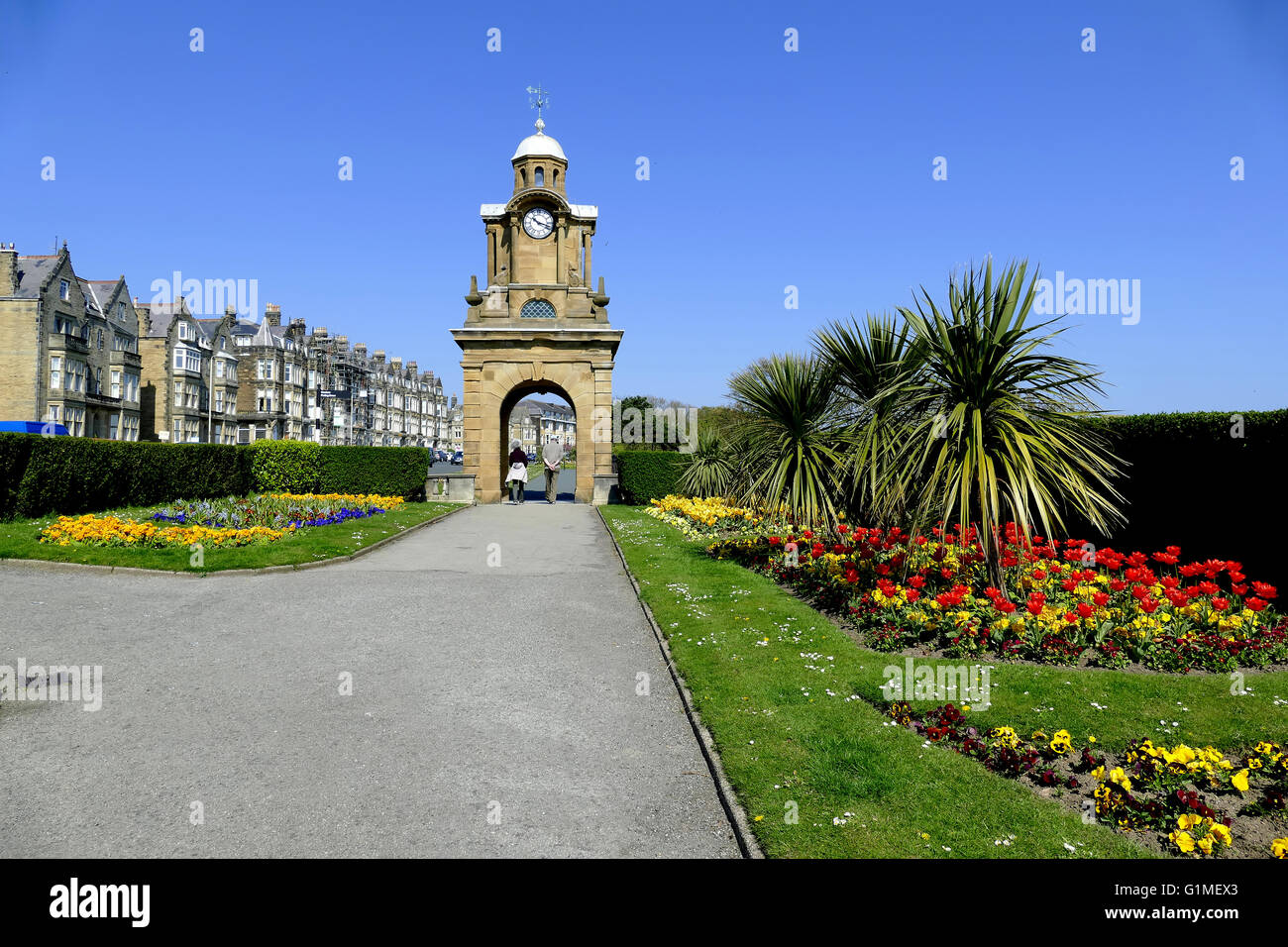 SCARBOROUGH, YORKSHIRE, UK. MAY 09, 2016.  The Holbeck clock tower and South cliff gardens at Scarborough in Yorkshire, UK. Stock Photo