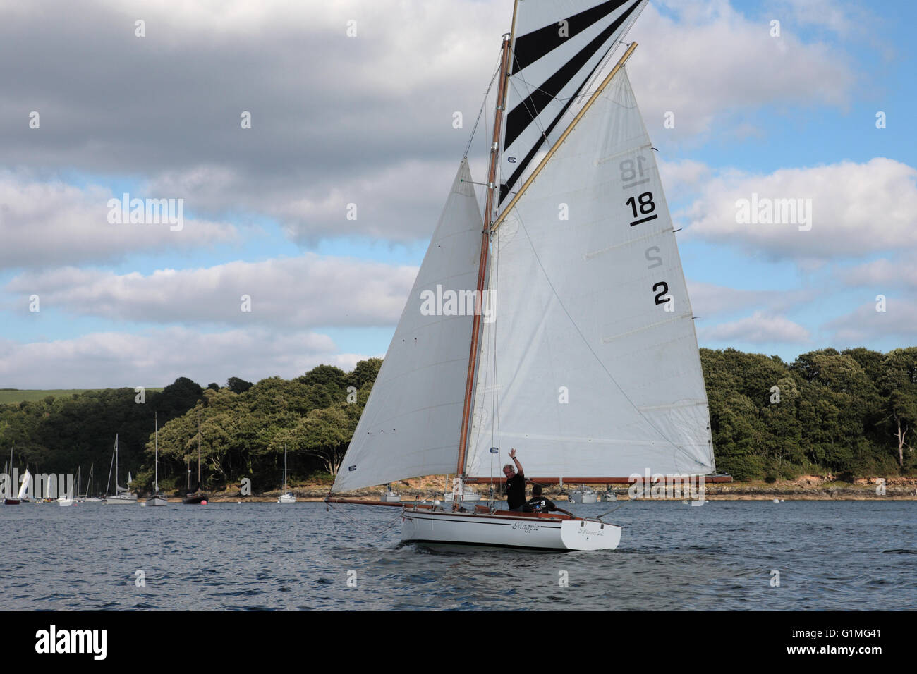 Falmouth 18 ft Restricted Class, No.2, 'Magpie' in the entrance to the Percuil River, St. Mawes, Cornwall, England Stock Photo