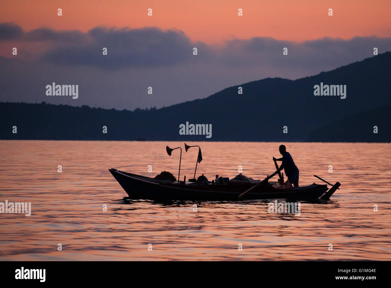 Ambracian Gulf, Vonitsa, Greece: fishing boat out at dawn Stock Photo