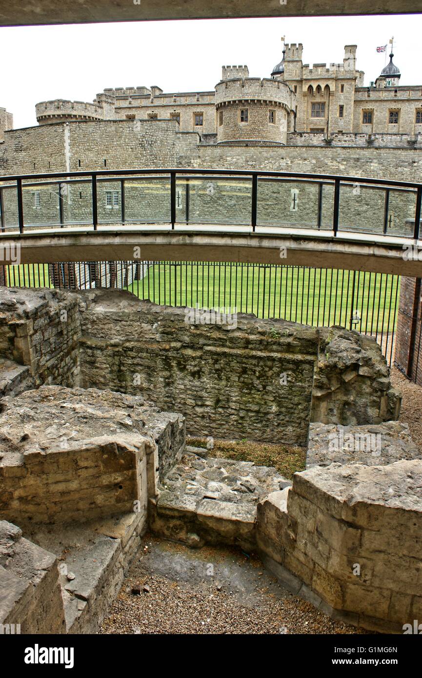 View to the Tower of London castle, seen from the Roman ruins, excavated near the Tower of London, England Stock Photo