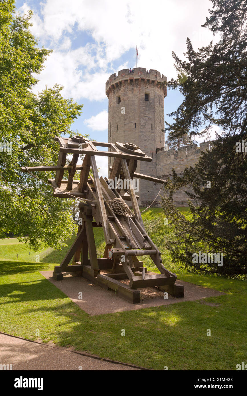 A medieval siege weapon catapult, at Warwick castle, Warwick, Warwickshire UK Stock Photo