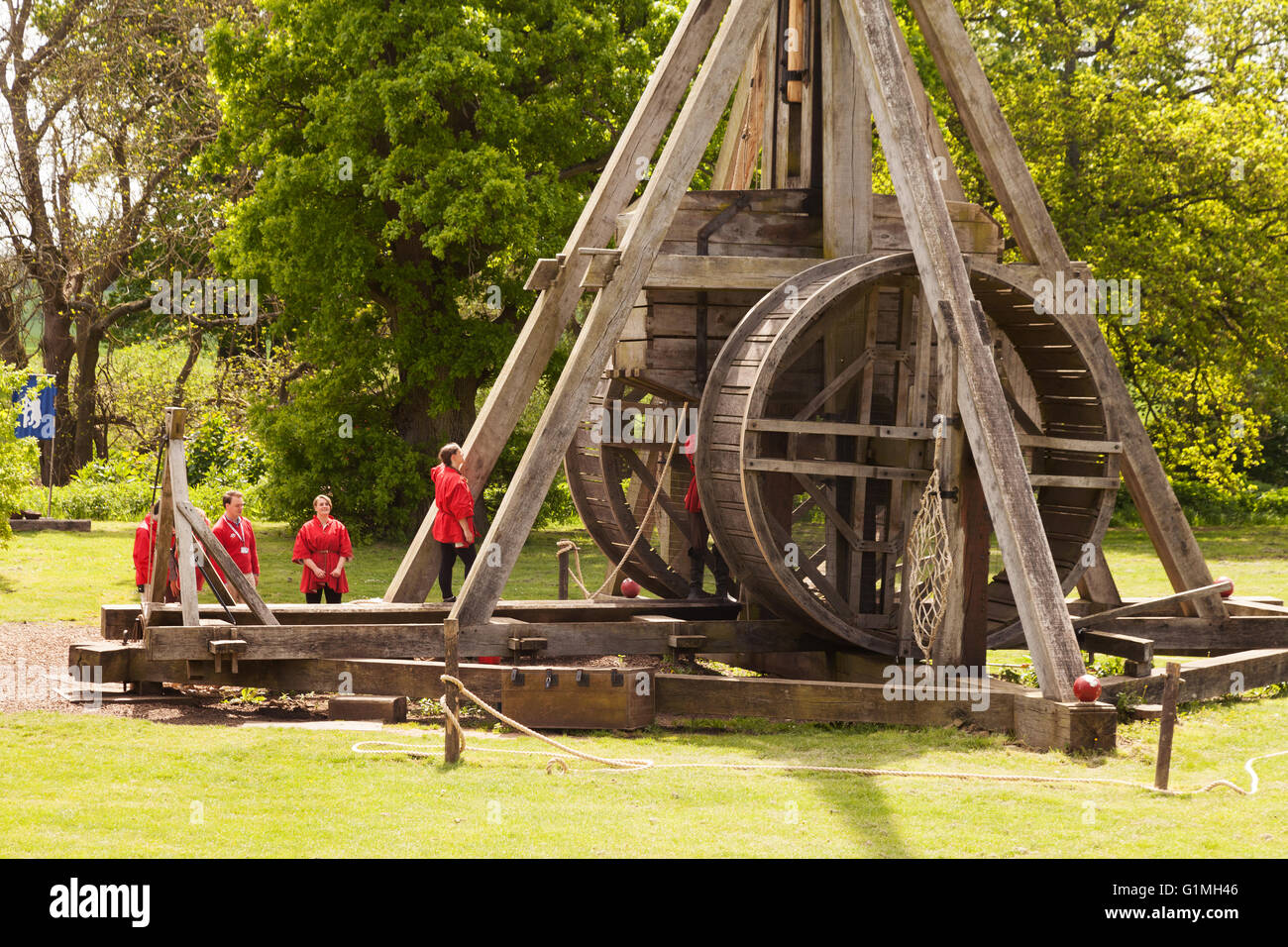 A working trebuchet ( medieval siege weapon ), and its operators