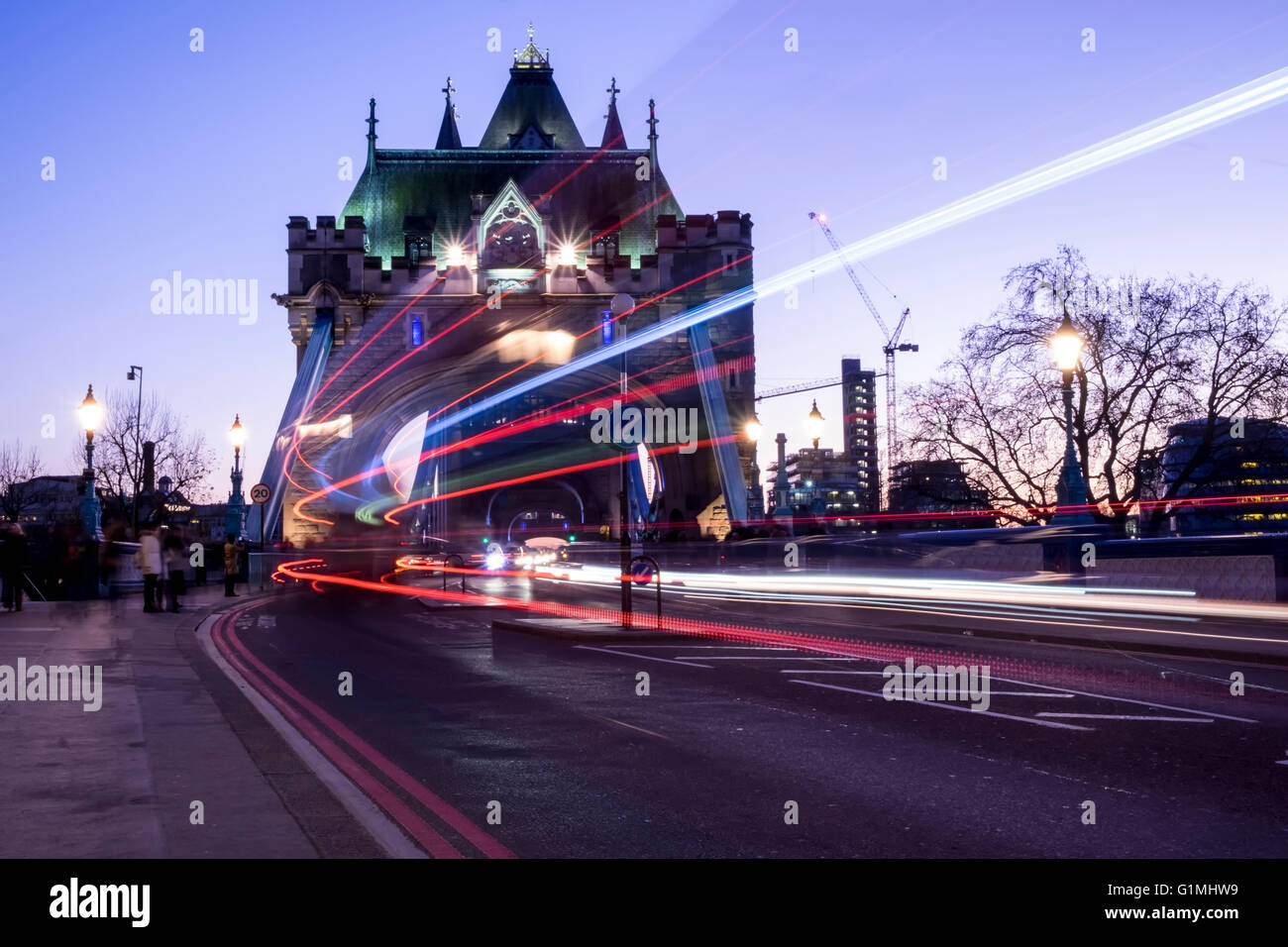 Light trails of a London Bus going over the iconic Tower Bridge Stock Photo