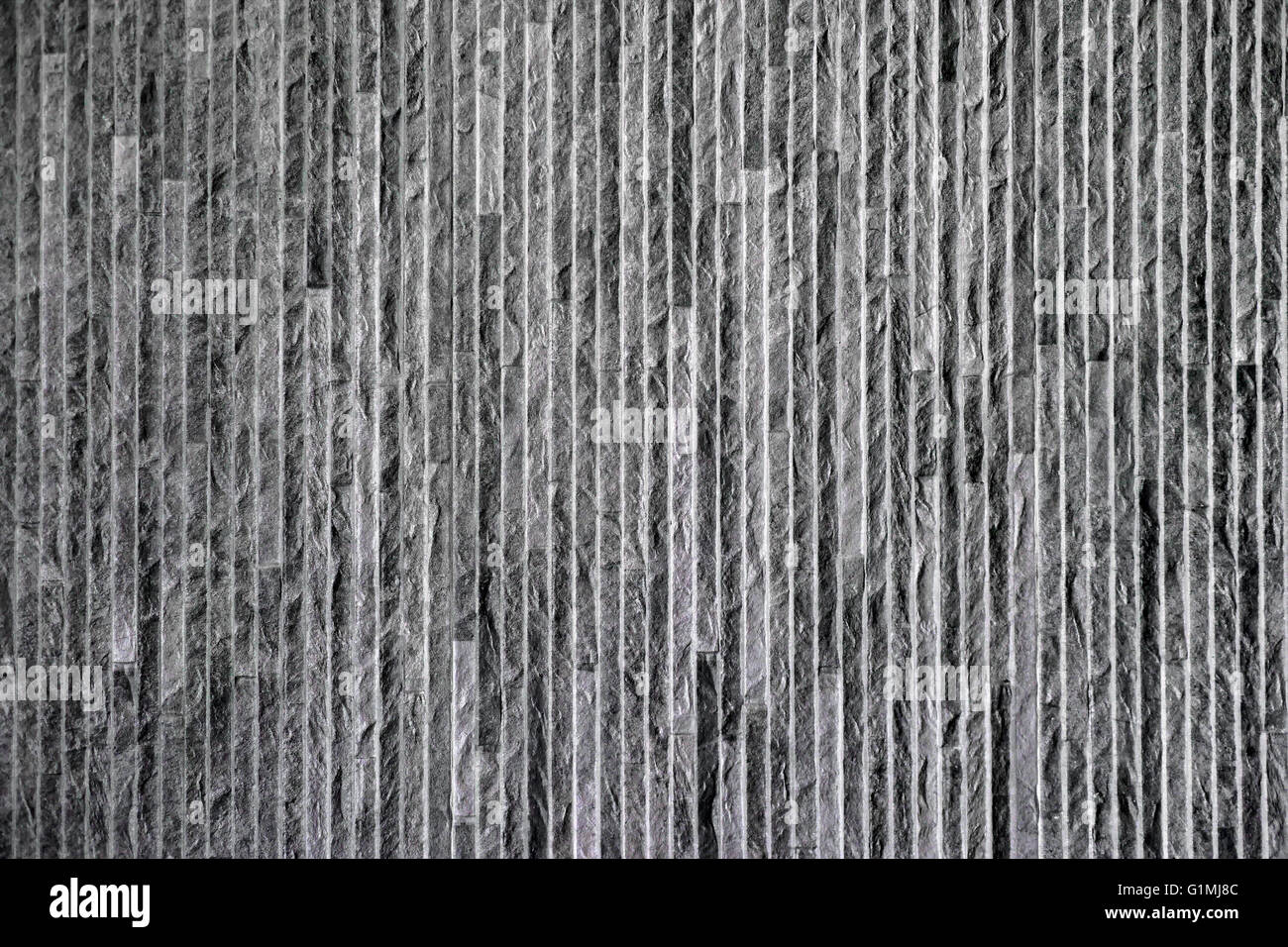 granite stone wall as background or texture Stock Photo - Alamy