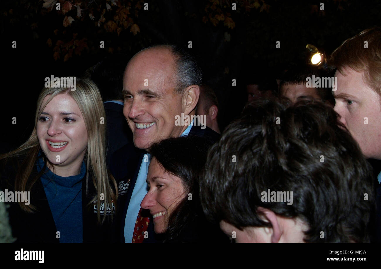 Former New York Mayor Rudy Giuliani and presidential candidate embraces