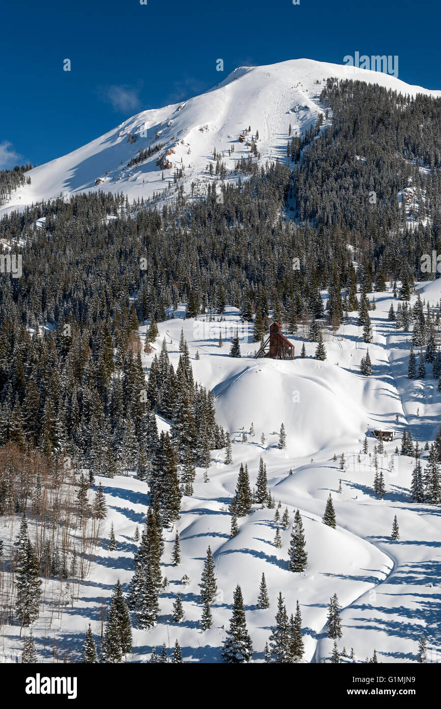 Red Mountain #2 and the ruins of the Yankee Girl mine in winter, near Red Mountain Pass in Ouray County, Colorado Stock Photo