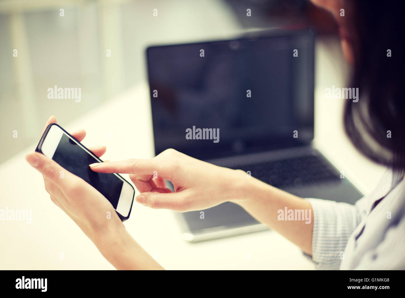 Texting Office close up of woman texting on smartphone at office Stock Photo - Alamy