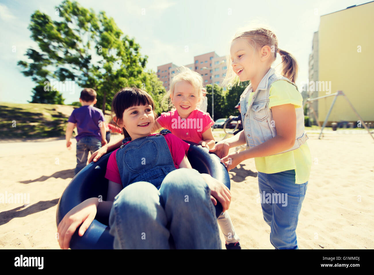 happy kids on children playground Stock Photo - Alamy