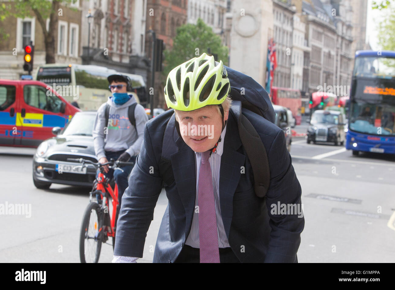 Boris Johnson cycling along Whitehall Stock Photo